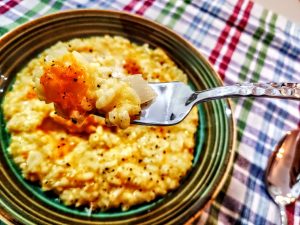 Primi piatti gluten free senza burro: risotto Carnaroli con zucca curcuma e formaggio Piave DOP